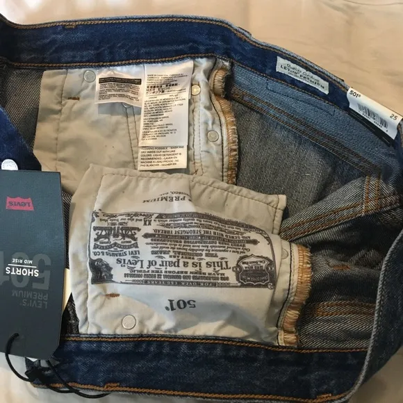 NWT Levi’s 501 Cutoff Denim Distressed Jean Shorts