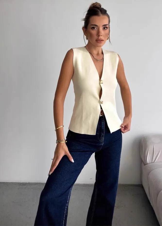 Sculpted Elegance - Sleeveless Asymmetrical Button Vest